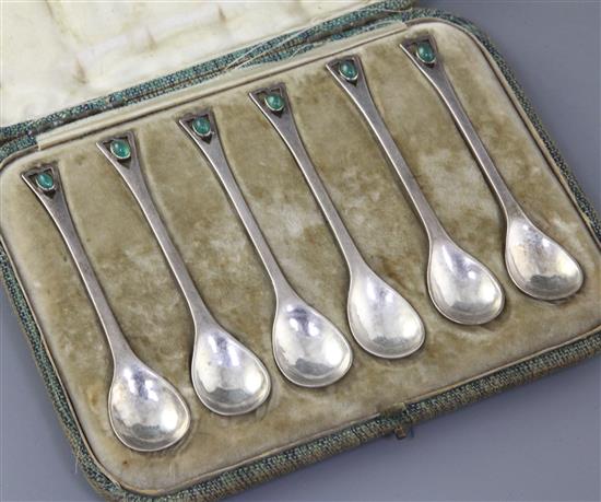 Guild of Handicraft: A cased set of six Arts & Crafts silver and cabochon green chrysophase set teaspoons, London 1902